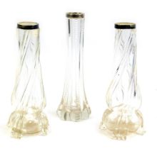Three Victorian cut glass posy vases, each with silvered collar, 20cm high.