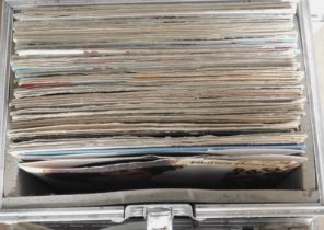 An aluminium and black finish record case, and contents of 33rpm records, to include mainly rock and