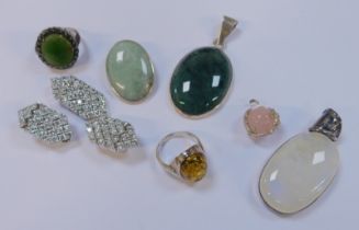 A group of silver stone set jewellery, comprising two silver rings, two pendants, a brooch, pendant