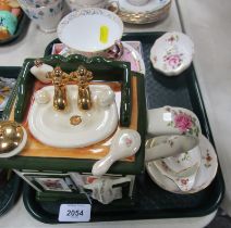 A Tony Carter novelty teapot, together with a Royal Crown Derby Derby Posies tea strainer, trinket d