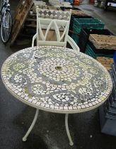 A Leisure Grow metal garden table and chairs, painted in white with a mosaic top.