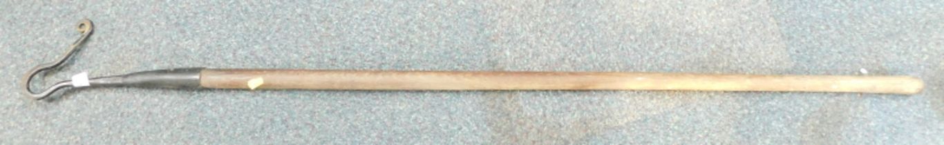 A wood and wrought iron shepherd's crook.