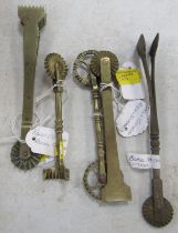 A small collection of Victorian brass pastry cutters and trimmers. (5)