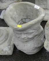 A reconstituted stone large Toby jug garden planter, 42cm high.