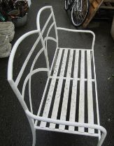 A white metal painted two seated bench.