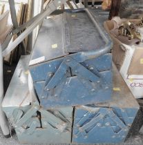 Three cantilever tool boxes, containing various contents.