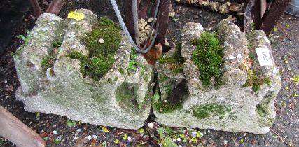 Two reconstituted stone stands.