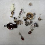 A group of assorted silver and other costume jewellery, to include silver pendants, ambler style pen