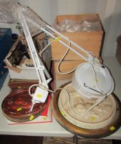 An anglepoise type lamp, various pottery cow figures, unglazed bought from the Sylvac factory, other