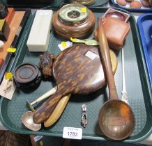 A 1920s simulated tortoiseshell hand mirror, together with a baby spoon and pushed, cased dominoes,