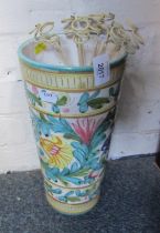 An Italian pottery cylindrical vase, decorated with flowers, 30cm high.
