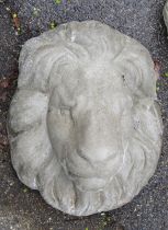 A reconstituted stone lion head wall mask, 38cm high.