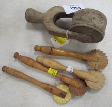 A Victorian treen pastry pattern roller and four pastry cutters. (5)