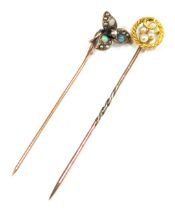 Two stick pins, comprising a stick pin set with opal and seed pearl with three leaf clover top, unma