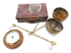 A set of brass hand scales, aneroid barometer in carved oak case, and a suitcase. (AF)