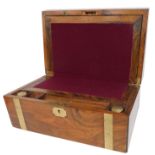 A rosewood and brass bound writing box, the hinged lid enclosing a later baize lined writing slope,
