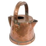 A late Victorian copper jug, with swing handle, 38cm high.
