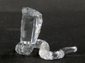 A Swarovski crystal figure of a cobra snake, 5cm high, boxed.