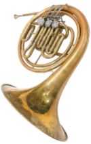 A brass tuba, with stainless steel mouthpiece, in fitted case.