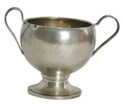 A white metal trophy cup, with two arched handles, on a stepped and ribbed foot, white metal stamped