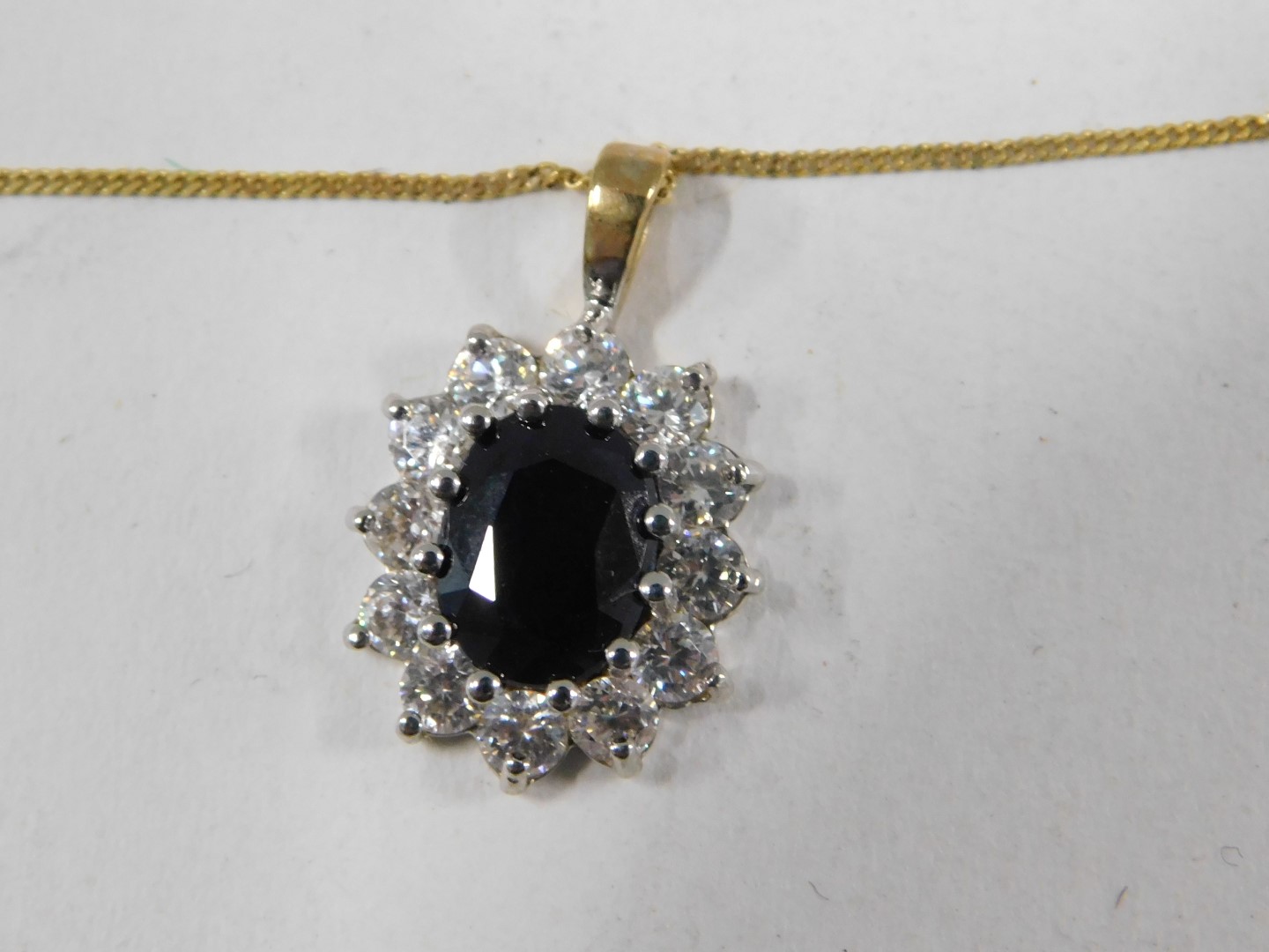 A pendant and chain, the floral cluster pendant set with imitation sapphire and diamond, 2cm high, o - Image 3 of 4