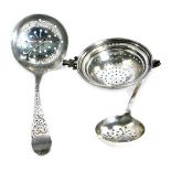 Silver wares, comprising two Victorian silver sifter spoons, Sheffield 1942, and another with arched