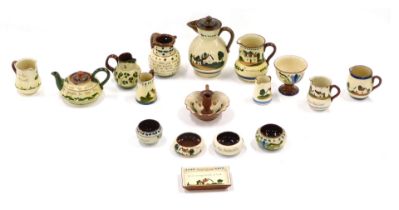 A quantity of Devon Mottoware, to include Torquay ware. (1 tray)