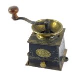 A Hawkins & Co Warranted cast iron coffee mill or grinder, 14cm wide.