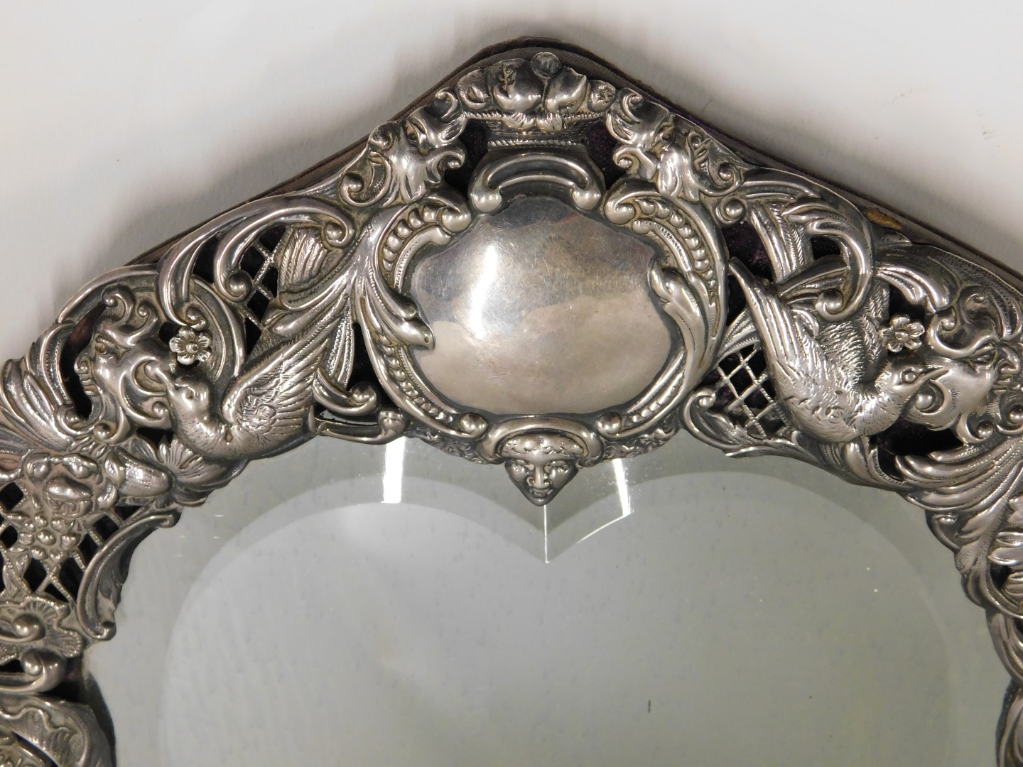 A late Victorian silver dressing table mirror, the bevelled love heart shaped mirror panel surrounde - Image 3 of 4