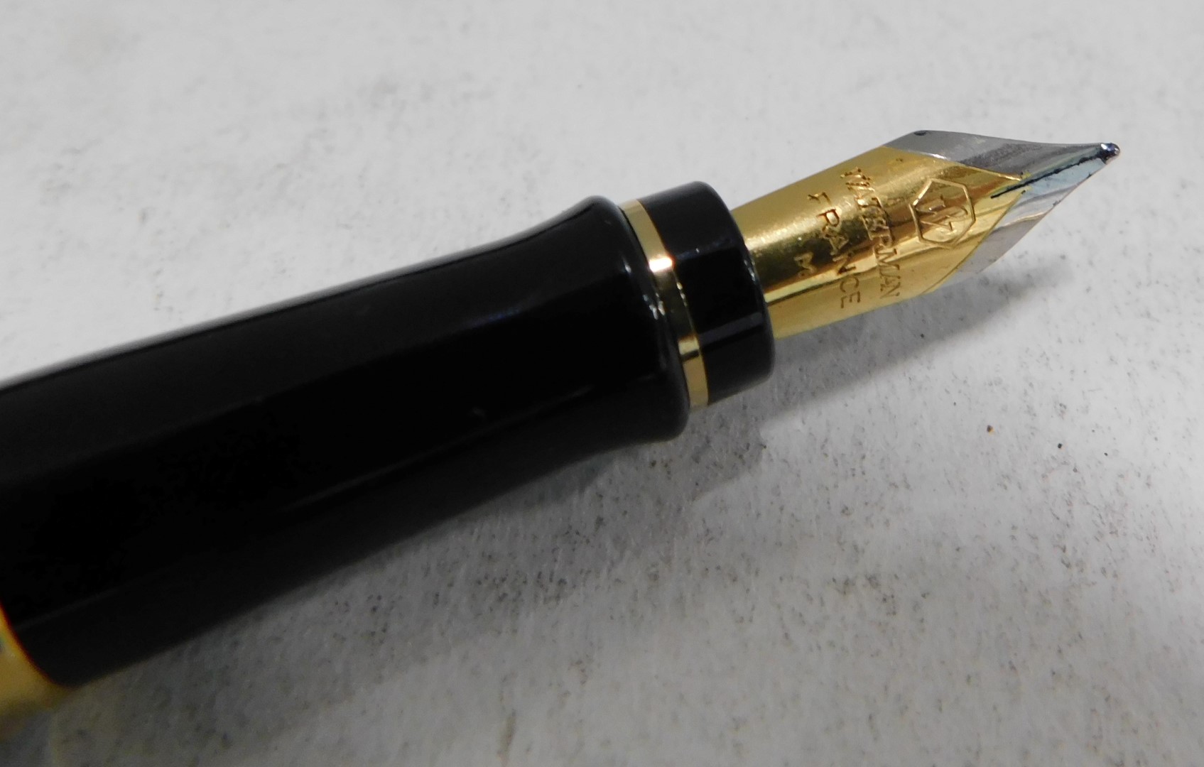 A cased set of three graduated Waterman pens, a Parker fountain and biro set, in gold coloured etche - Image 3 of 3