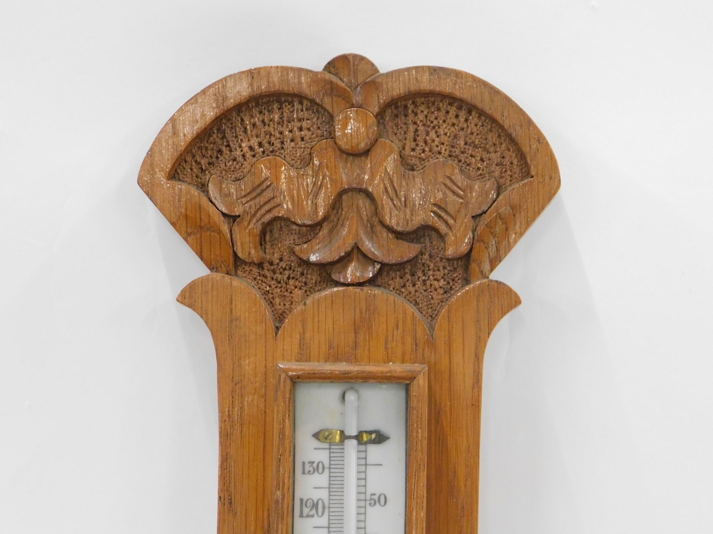 A 19thC oak aneroid barometer, with white painted dial, carved top, 76cm high. - Image 4 of 4