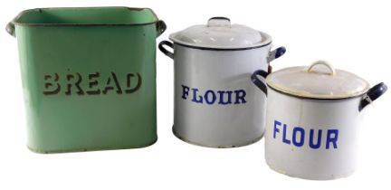 1920s enamel wares, comprising a green enamel flour bin, 29cm high, and two cylindrical flour bins i