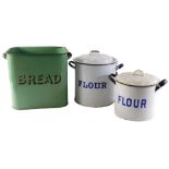 1920s enamel wares, comprising a green enamel flour bin, 29cm high, and two cylindrical flour bins i