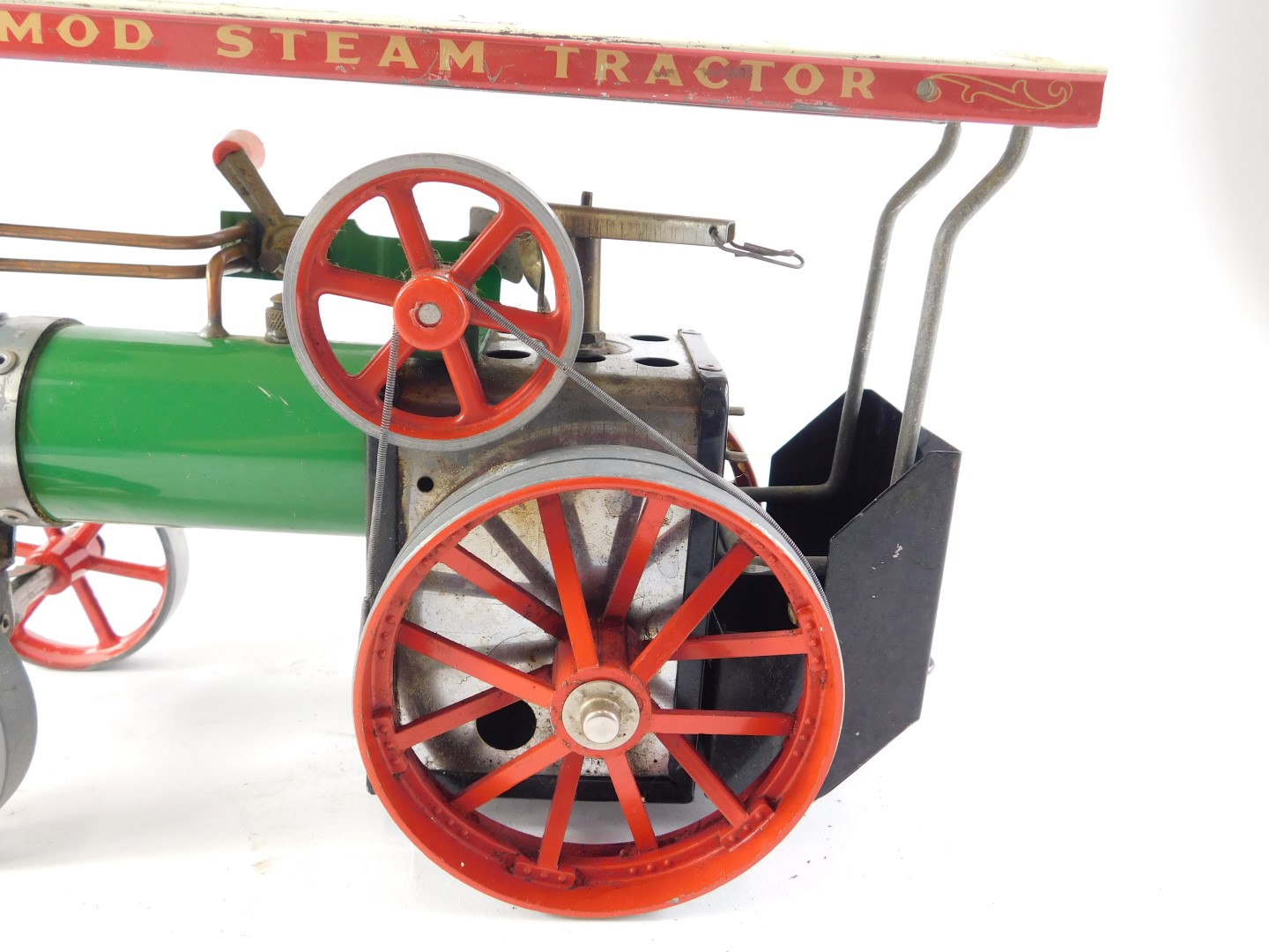 A Mamod model traction engine, painted in typical green, black and red livery, 26cm wide. - Image 2 of 4