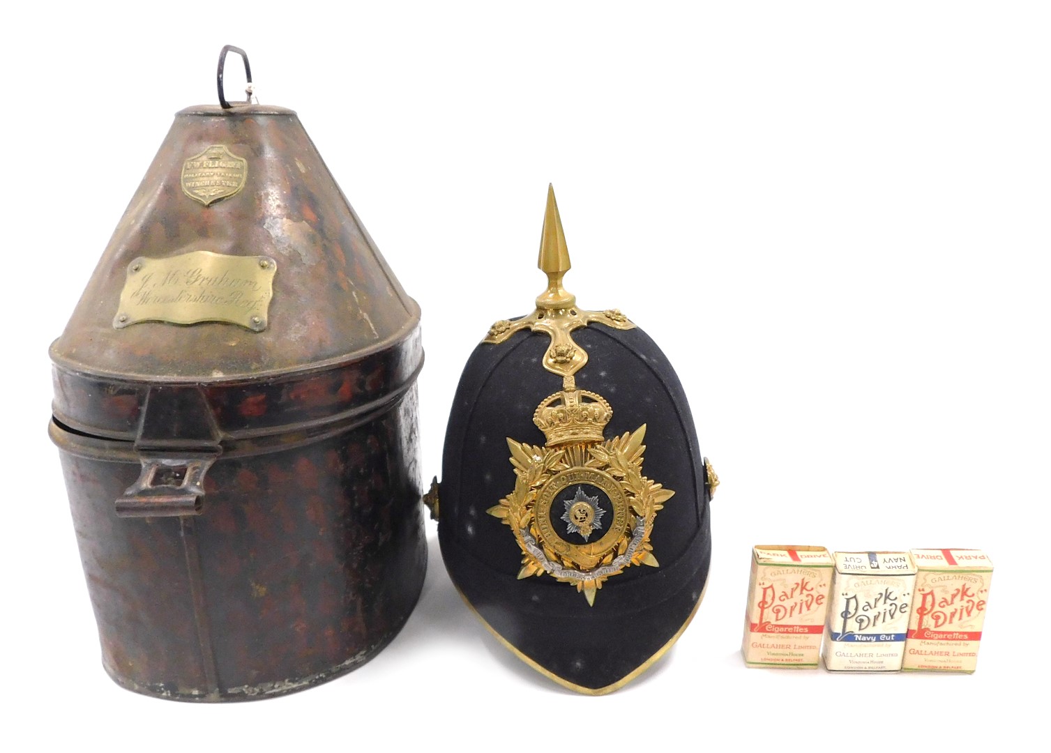 A 19thC Worcestershire regimental helmet, with crest and gilt metal spike, in original tin box, engr