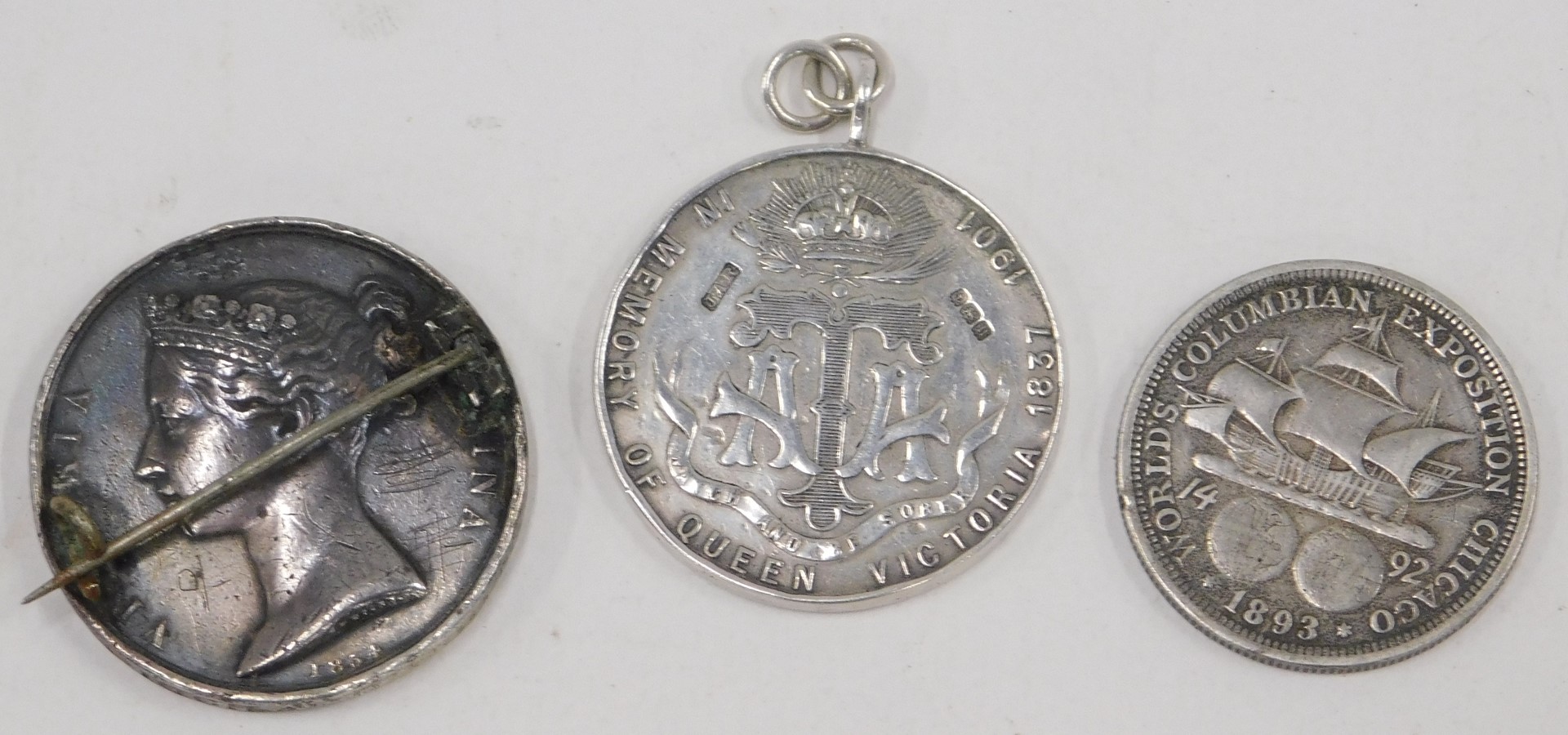 A silver commemorative Victoria medal, dated 1901, a Victoria silver crown dated 1874 converted to a - Image 2 of 2