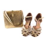 A pair of ladies 1940s snake skin sandals, and associated hand bag, retailed by Barratts. (2, AF)
