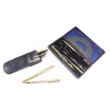 A cased set of three graduated Waterman pens, a Parker fountain and biro set, in gold coloured etche