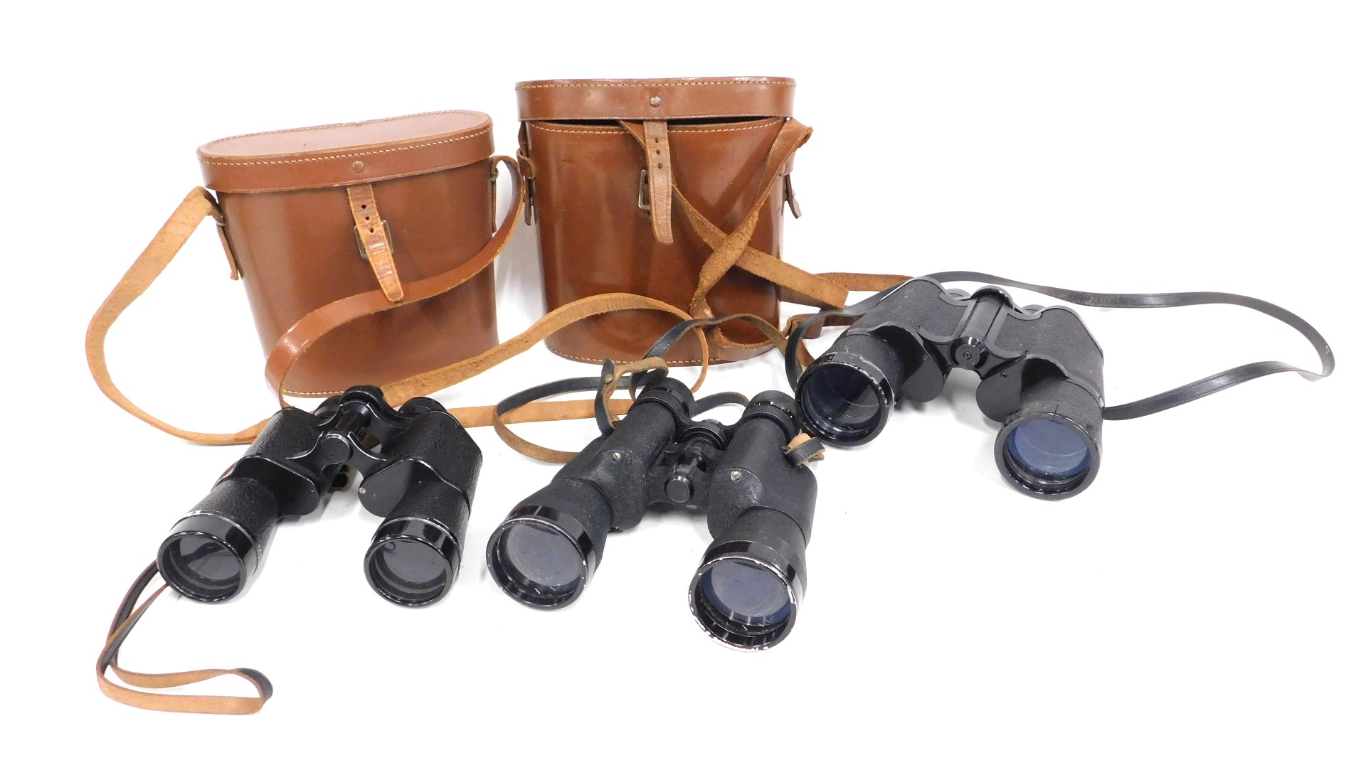 Three pairs of binoculars, comprising a set of 10x50 binoculars, Prinz 10x50 binoculars, and Ray of