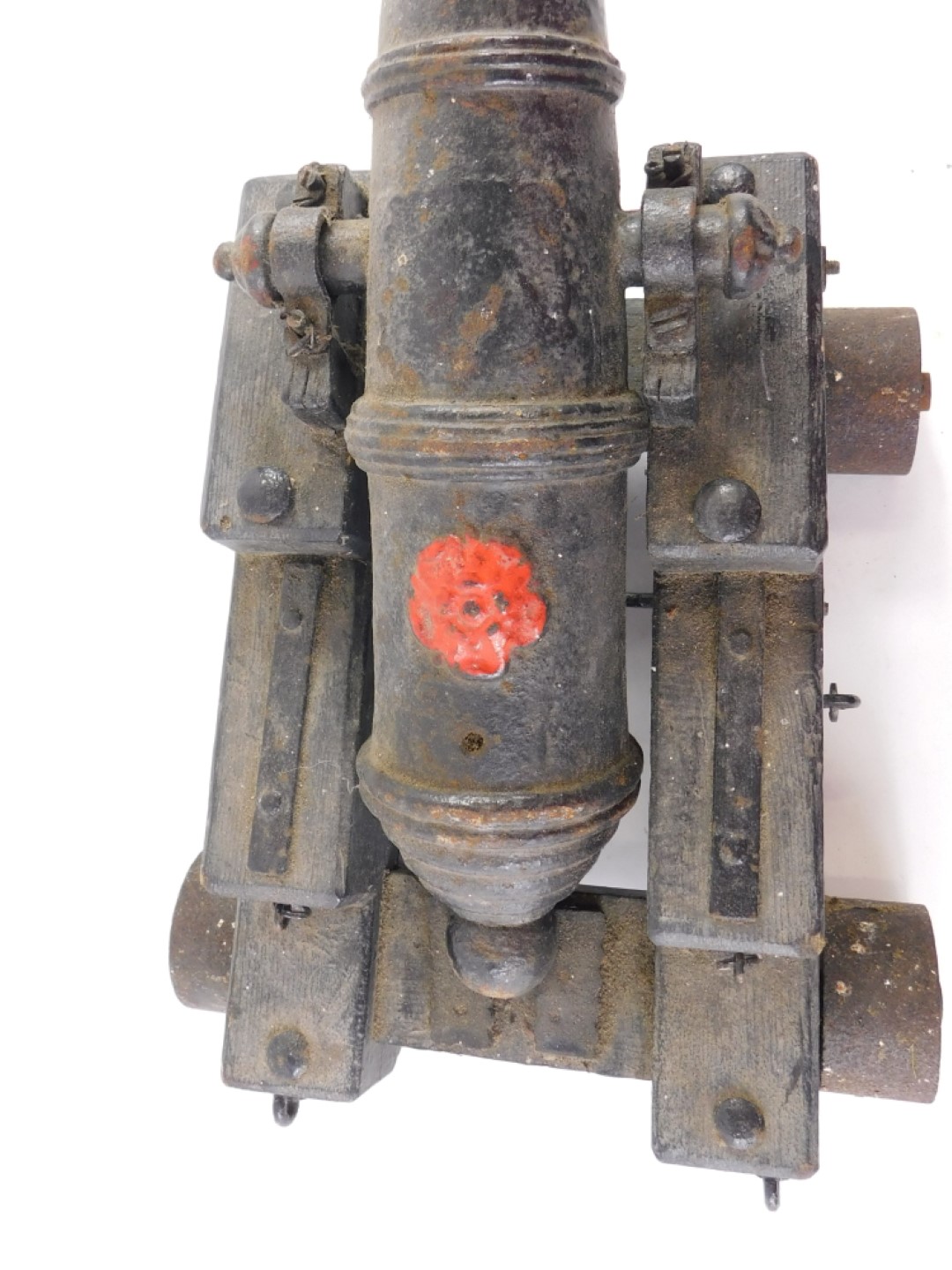 A 19thC signalling cannon, painted black, cast with a single flower head or rose, later painted in r - Image 2 of 2