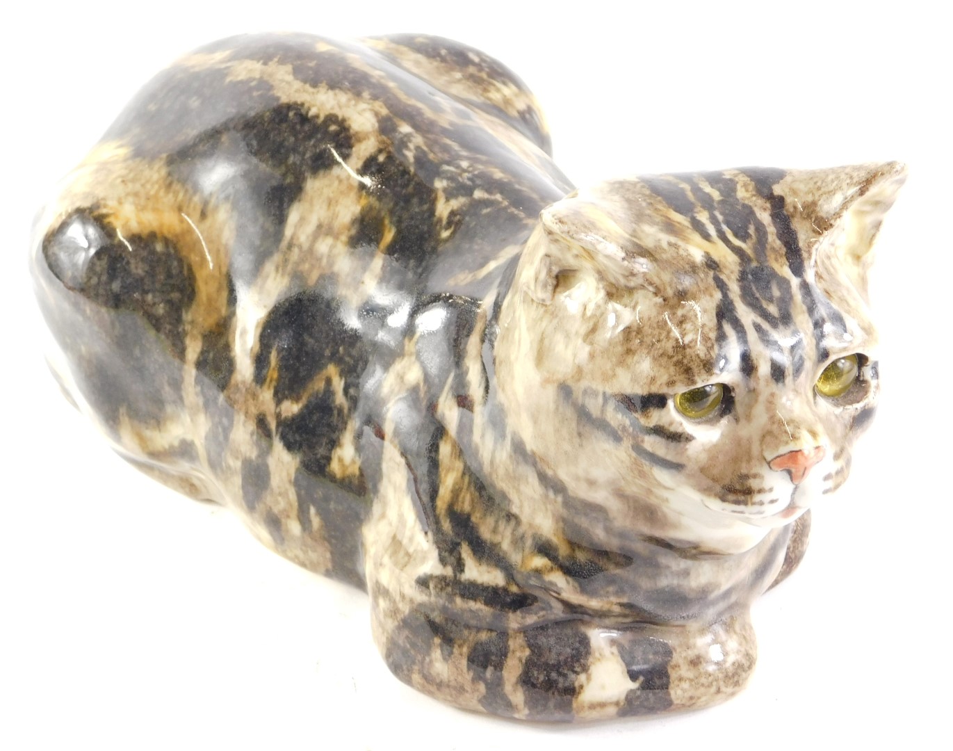 A seated Winstanley tabby cat, numbered 5, 36cm long.
