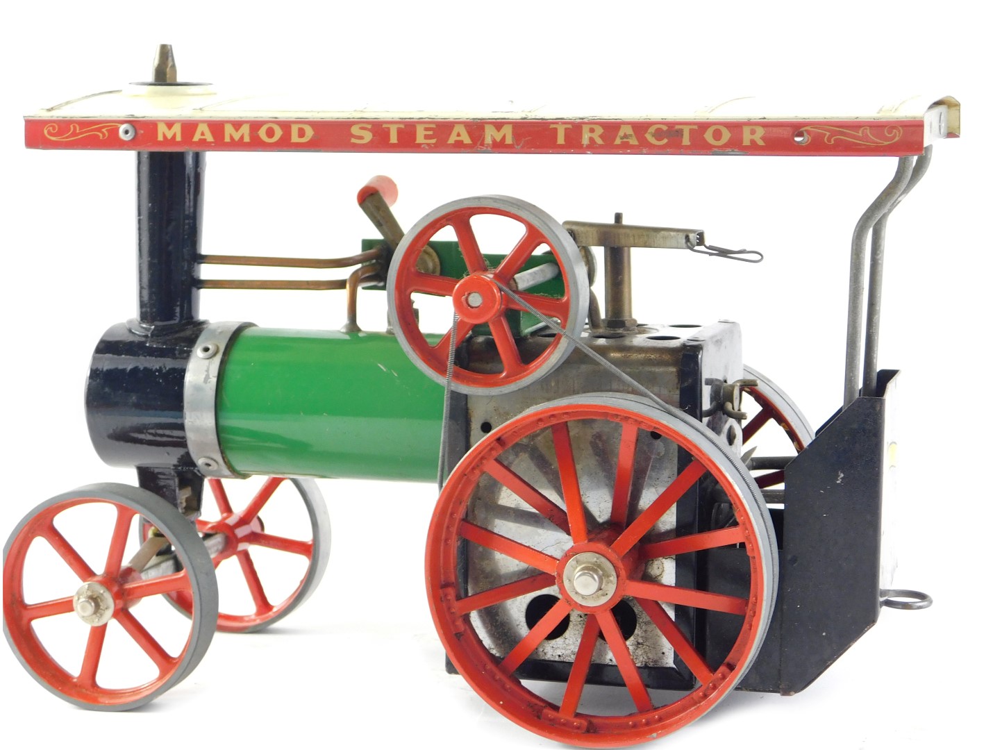 A Mamod model traction engine, painted in typical green, black and red livery, 26cm wide.