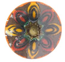 A Poole Delphis charger, decorated with ovals in shades of orange, green, yellow, etc., 27cm diamete