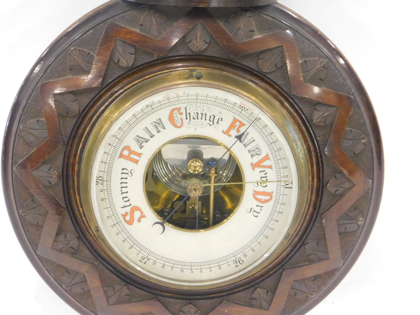 A late 19th/early 20thC carved mahogany aneroid barometer, 48cm high. - Image 2 of 3