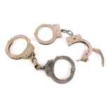 20thC British handcuffs, to include Haitt.