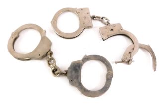 20thC British handcuffs, to include Haitt.