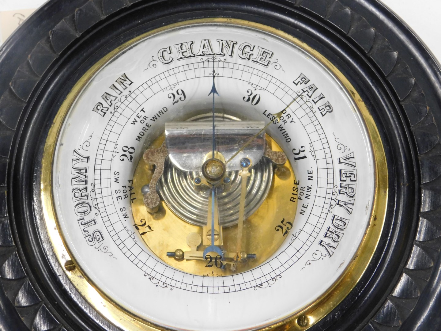 A late 19th/early 20thC ebonised aneroid barometer, with circular case, 21cm diameter. - Image 2 of 2