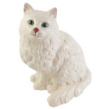 A Royal Doulton ceramic model of a white cat, 21cm high, boxed.
