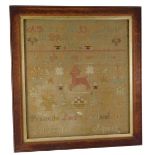A 19thC sampler by Mary Ellen Clark aged 10, embroidered with stag, alphabet, etc., in oak frame, 53