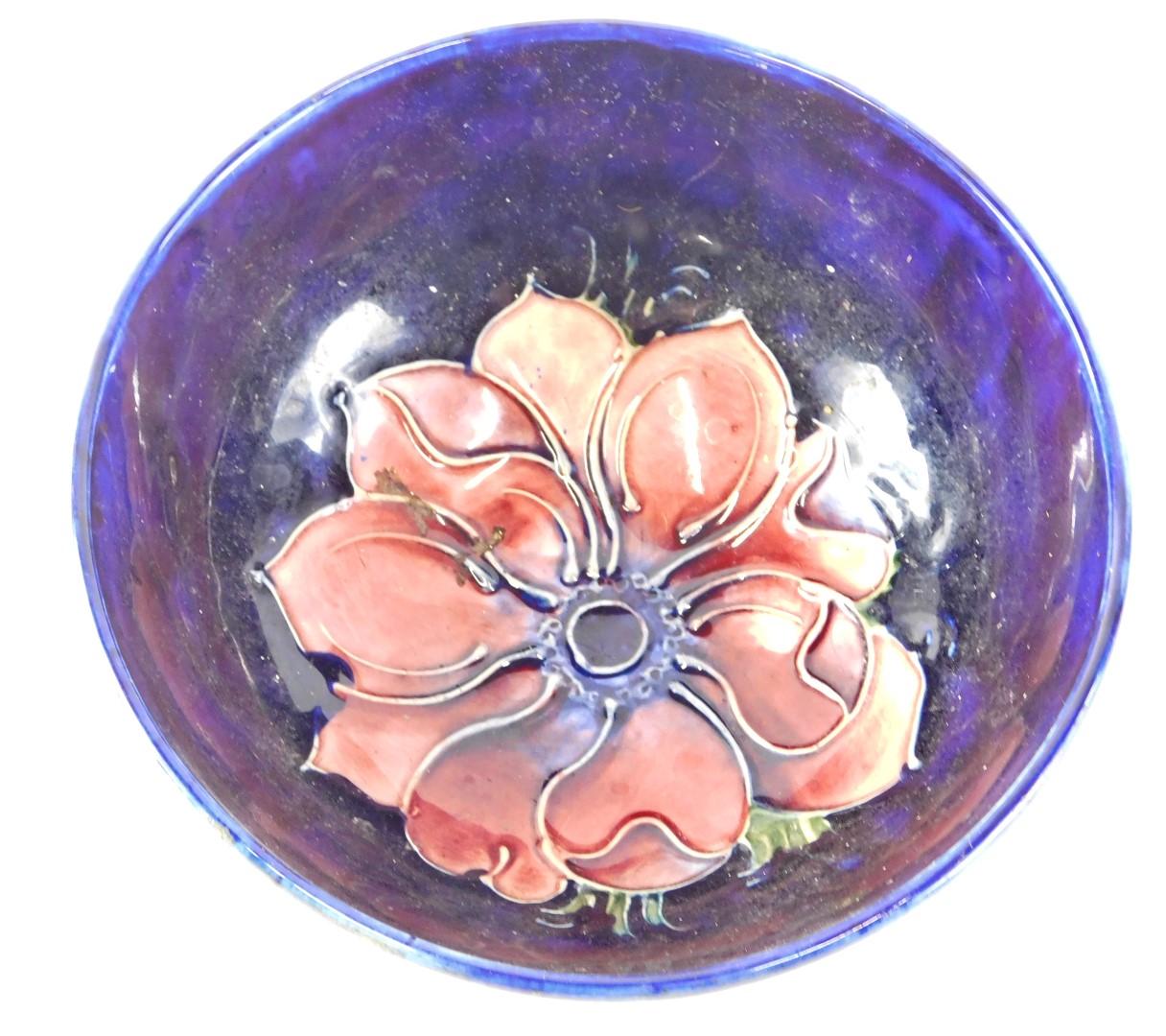 A Moorcroft Anemone pattern bowl, on a glazed blue ground with pink flowers, stamped to underside, 1 - Image 2 of 3